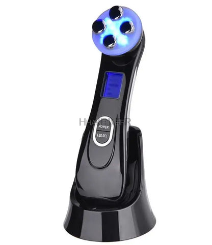 Black handheld device with LED lights and digital display on a white background